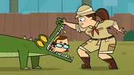 Beth climbs into the aligator's mouth.