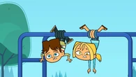 The pineapple hangs up Cody and Bridgette to the monkey bars.