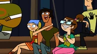 Lindsay clinging onto Justin, right before Chris throws Gilded Chris Awards at the trio.
