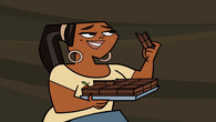 Leshawna takes some brownies from the lodge.