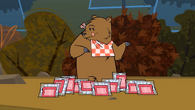 The bear tries to enjoy some marshmallows again.