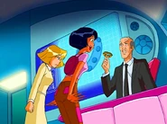 Clover and Alexandra staring at the bracelet