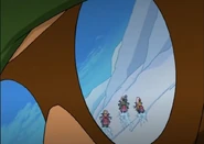 In the reflection of Tim Scam's ski goggles.