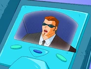 A WOOHP Agent talking to jerry on his wallet phone