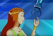 Samantha receiving the ring from G.L.A.D.I.S.