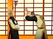 Jerry Lewis bowing to his Feng Shui guru.