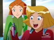 Clover holding the Ode de Glass Liquifier