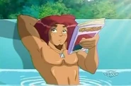 T-Bone at his hot tub reading the celebrity magazine.