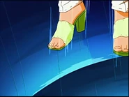 Sam's feet green sandal.