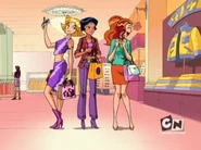 The cashmere sweater Sam buys for Scam on display.