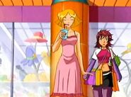 Clover enjoying a smoothie while Tara carries her shopping bags.