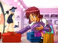 Tara picking up the clothes Clover picked out.