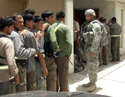 Sons of Iraq fighters being paid.
