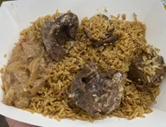 Senegalese lamb meat over rice