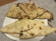 Naan bread, with origins in ancient Persia