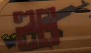 A Kataris 26 symbol on a car door