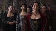 Anne as a lady-in-waiting to Queen Catherine of Aragon