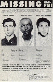 A missing poster for three murdered activists during the 