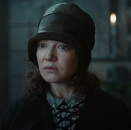 Rath addressing a conference of war widows