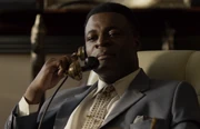 Tshombe speaking to  on the phone