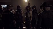 Members of Eden's Gate rallying around their leader, Joseph Seed