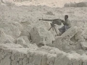 A Somali fighter on a machine-gun