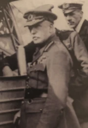 With two other officers, John French looks over the wreckage of a German Zeppelin shot down in France returning from a raid on England.