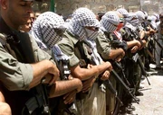 Tanzim fighters praying