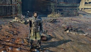 Talion sheathing his sword after another battle