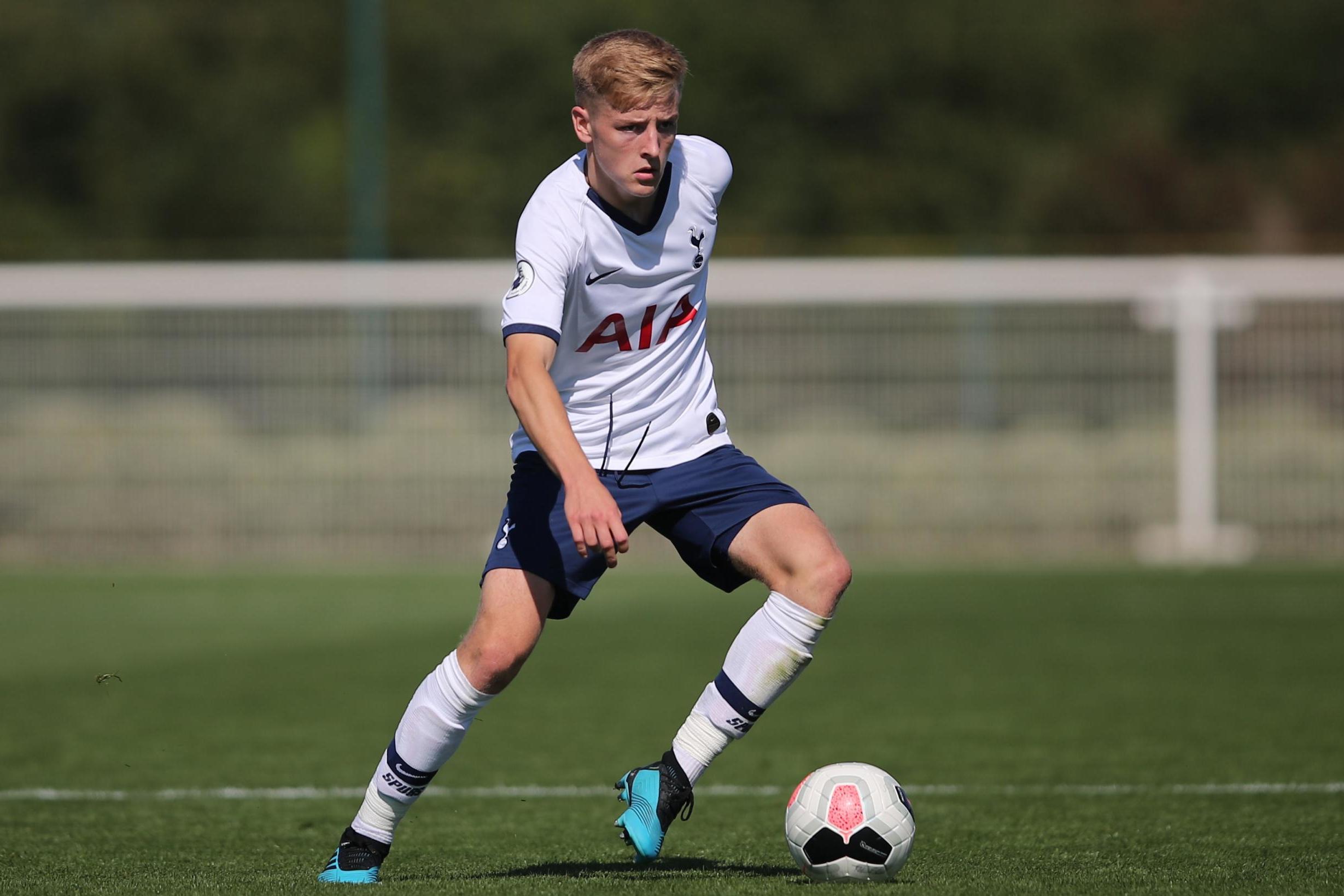 Tottenham academy midfielder Harvey White signs new three year