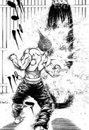 Kiichi punching a bag in the Tough manga series.