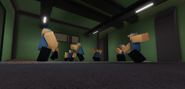 Seven bobos are dancing in a warehouse.