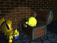 Gil surprised to see Pac-Man come out of a treasure chest.