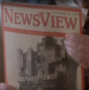 Abigail Gregory from Tower of Terror holding NewsView Magazine.