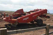A Trailed Grimme Destoner machine preparing carrot beds in 2009