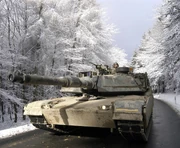 Tankers drive an M1A1 Abrams through the  Mountains north of  during Exercise Ready Crucible in February, 2005.