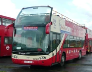 Nearside view of an Original Tour Bravo City bus.