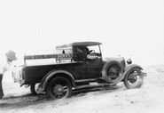 StateLibQld 1 167455 Model A Ford utility driving through sand, Cribb Island, ca. 1929