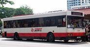TIB927J, a Dennis Lance 245 with Duple Metsec bodywork, operated by SMRT Buses. It is shown here operating on the Mass Rapid Transit (Singapore) Shuttle.