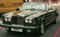 Rolls 501523 fh000007.jpg (149 KB) Rolls Royce Corniche c. 1986, a high-end prestige marque with a manually installed tonneau cover