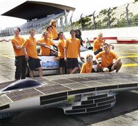  team at a racecourse.