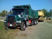 Volvo VHD84b Tri-axle Dump Truck