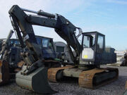 HY-MAC EXCAVATOR IN ARMY LIVERY.