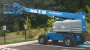 A Genie S-65 Boom lift on the Washington State University-Vancouver campus in Vancouver, Washington. Genie Industries is a subsidiary of Terex.
