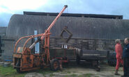 A 1940s R H NEAL Runabout 1T Yardcrane working used in a farm