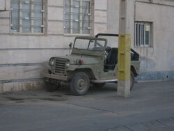 Jeep parked near street lamp - Qavvami ave - Nishapur 2