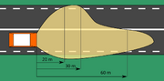 Low beam light pattern for right-hand traffic