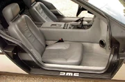 The grey interior and manual transmission in a DMC-12