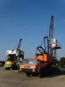 A pair of 1980s Priestman Crawlercrane and Priestman Cranetruck at work