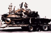 An M1A1 of 2nd Squadron, 11th Armored Cavalry Regiment "Eaglehorse" damaged during an ammunition explosion accident in Camp Doha, Kuwait on 11 July, 1991